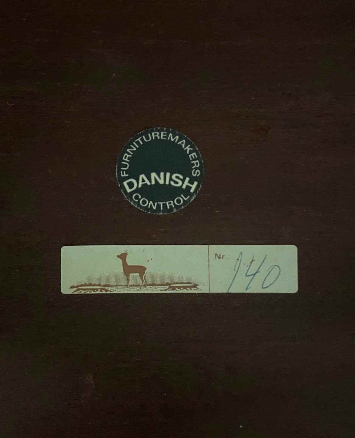 Label with 'Danish Furniture Makers Control' on a dark background