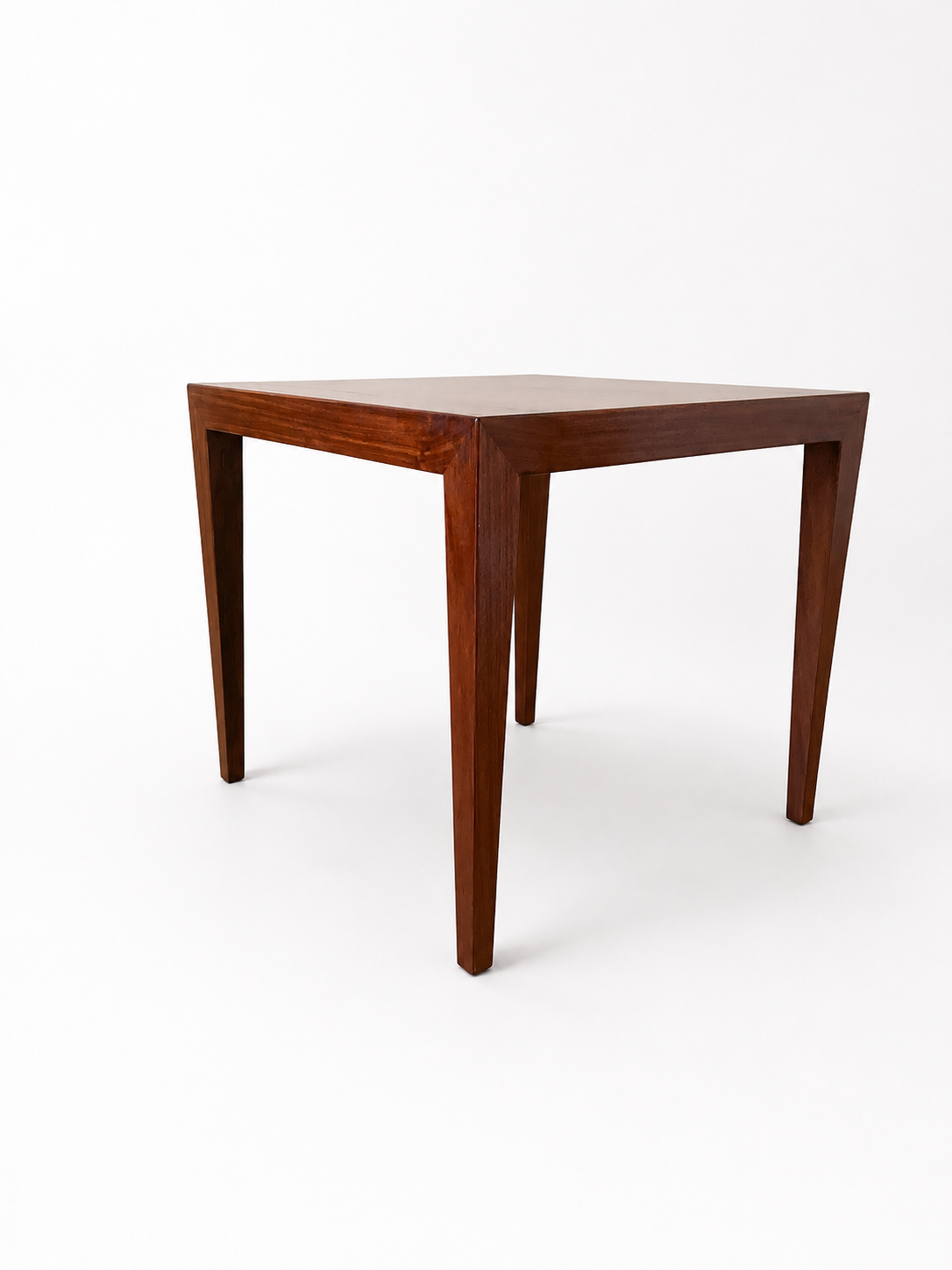 Wooden table on a white background