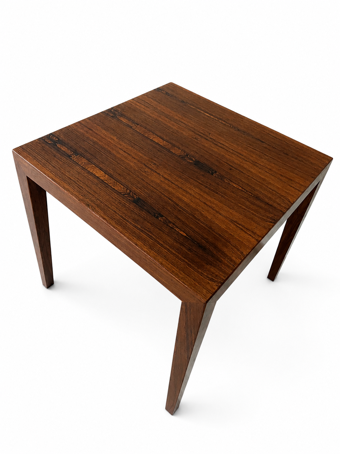 A square wooden side table with tapered legs, featuring a rich dark brown wood grain finish, photographed from an elevated angle on a white background.