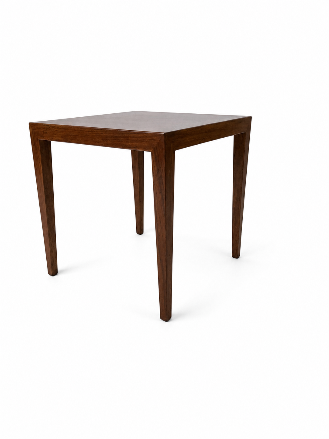 A square wooden side table with tapered legs, shown from a three-quarter angle on a plain white background.