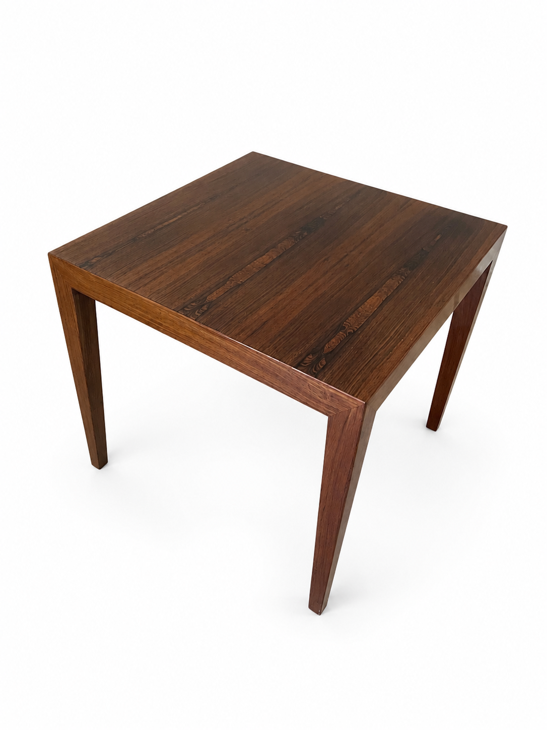 A square wooden side table with tapered legs, shown from an elevated angle on a plain white background.